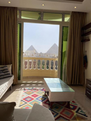 Queen Cleopatra pyramids view apartment